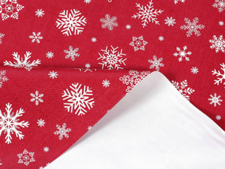 Cerata na stół na metry - świąteczny wzór śnieżynek na czerwonym - szer. 140 cm
