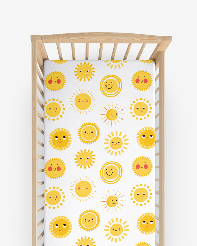 Bawełniane prześcieradło z gumką do łóżeczka - uśmiechnięte słoneczka