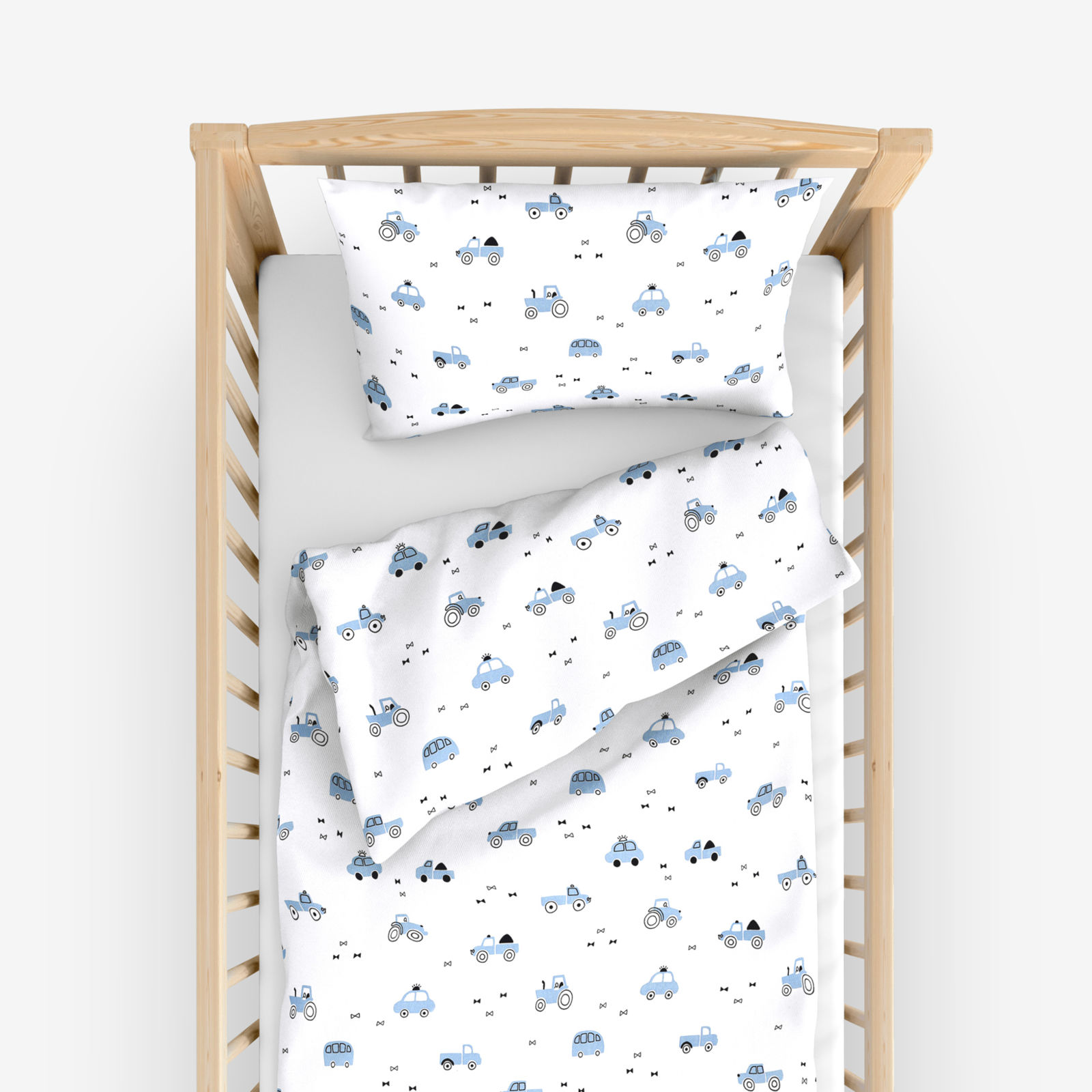 Pościel bawełniana do łóżeczka - niebieskie pojazdy na białym