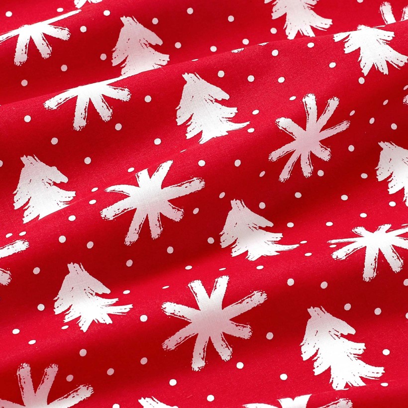 Płótno bawełniane - śnieżynki i choinki na czerwonym