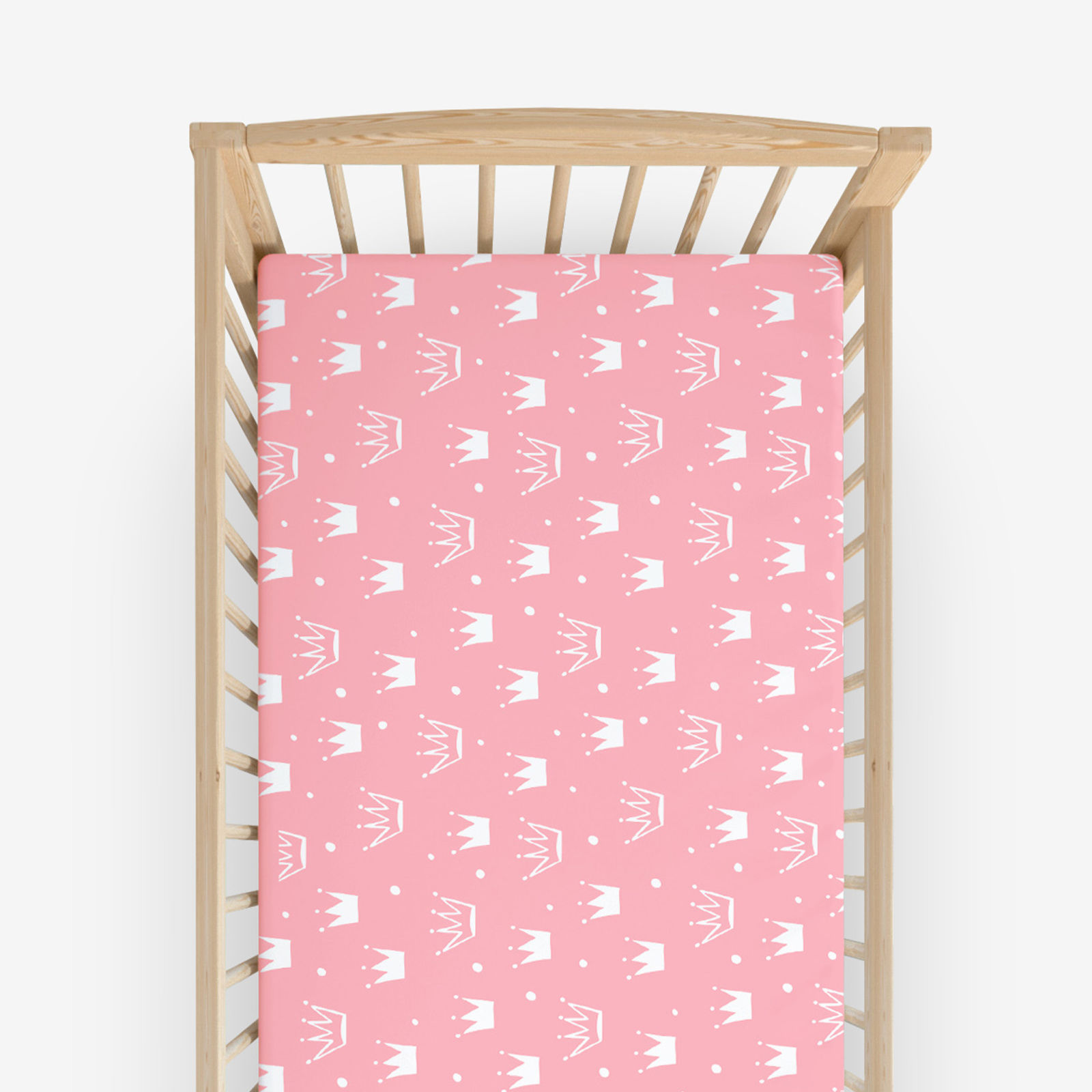 Bawełniane prześcieradło z gumką do łóżeczka - korony na różowym